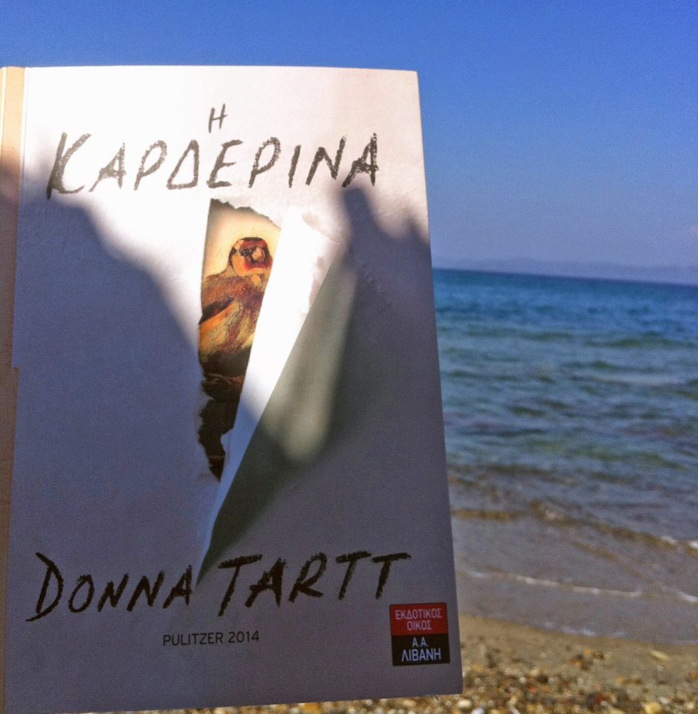 Reading on a sunny beach